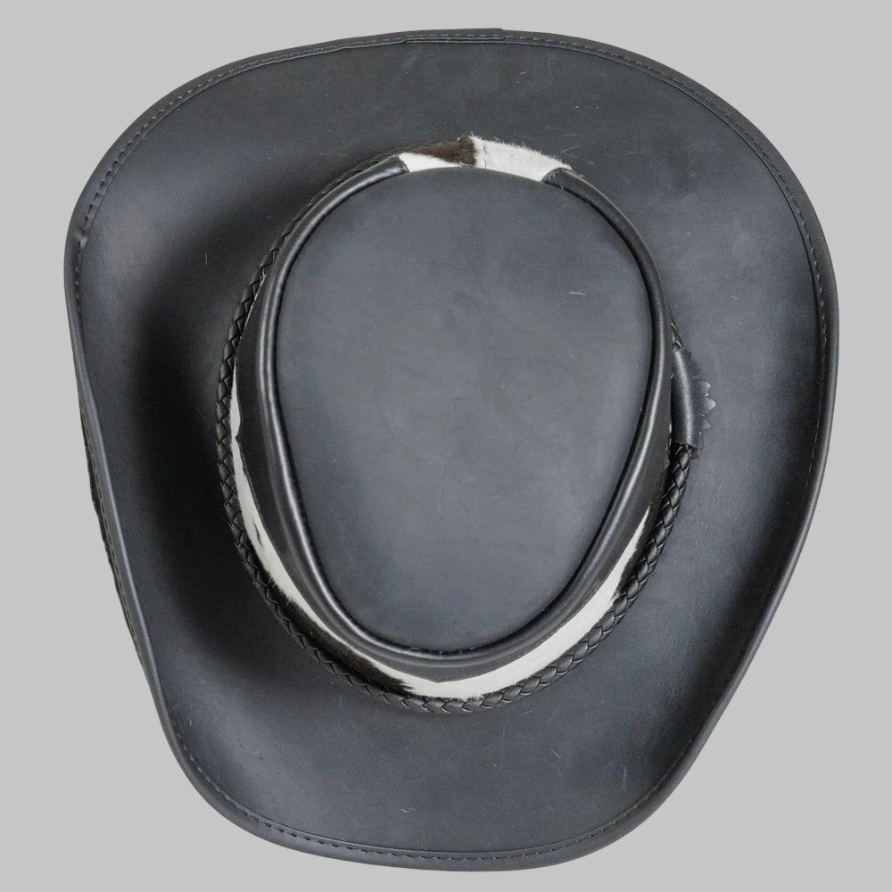 Black leather cowboy hat on a gray background