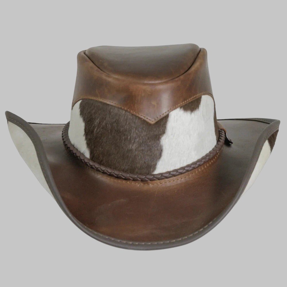 Brown leather cowboy hat with cowhide pattern on a gray background