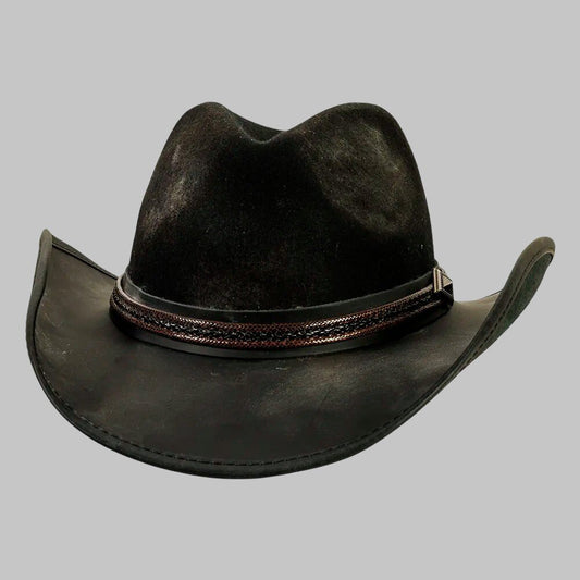Black leather cowboy hat with a brown band on a gray background