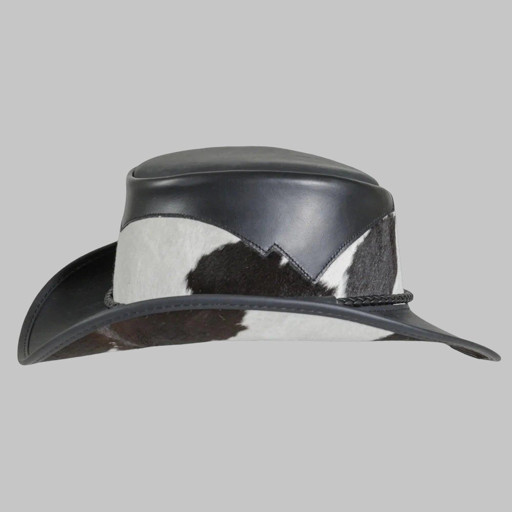 Cowboy hat with black and white pattern on a gray background